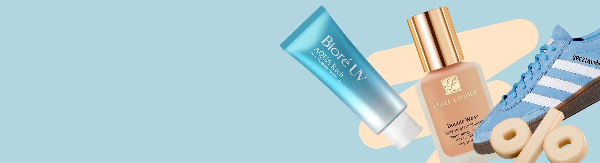 Sunscreen, foundation makeup, sneaker, and donuts on blue background
