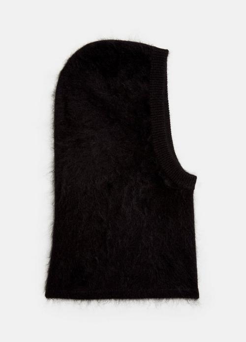 Black fuzzy knit balaclava laid flat on white background