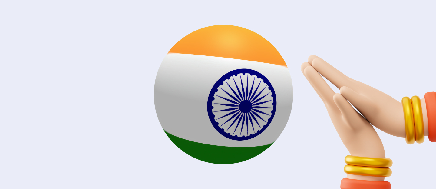 Indian flag with hand wearing gold and orange bangles