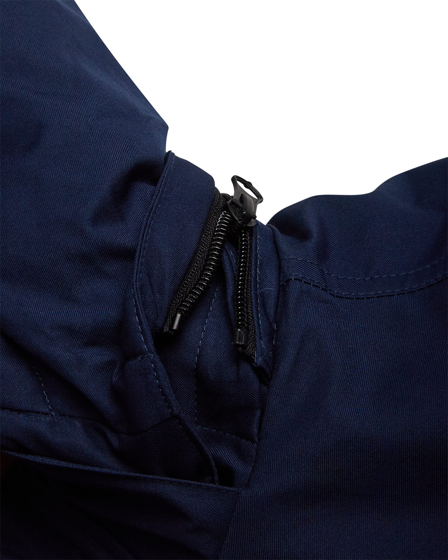 Close-up of black zipper pull with navy fabric showing quilted inner layer detail