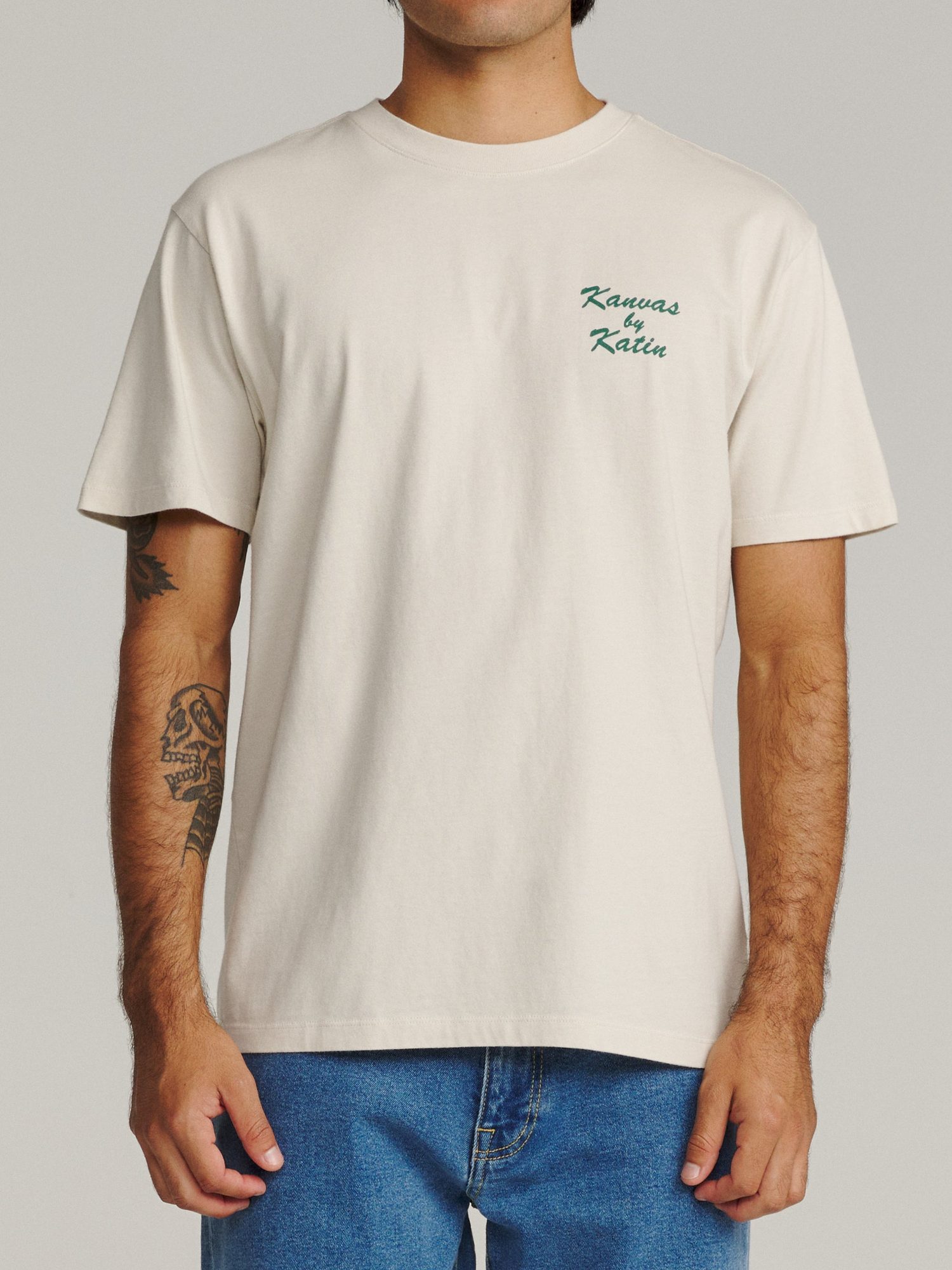 Front view of cream t-shirt with 'Kanvas by Katin' text embroidered on chest