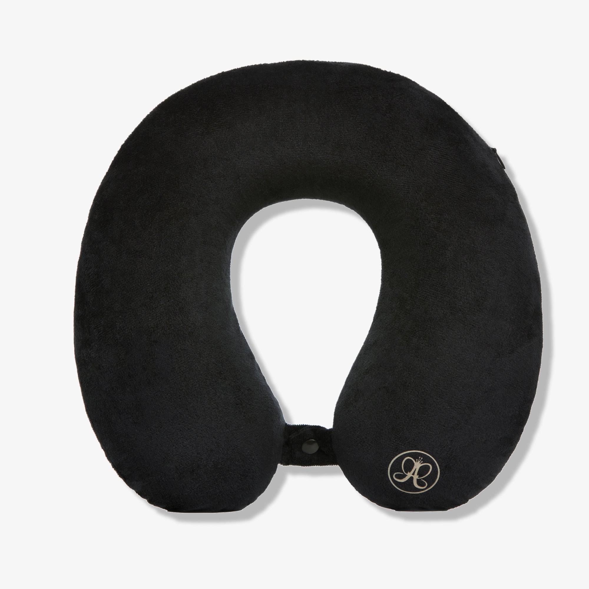 Black u-shaped memory foam neck pillow with button closure and branded emblem