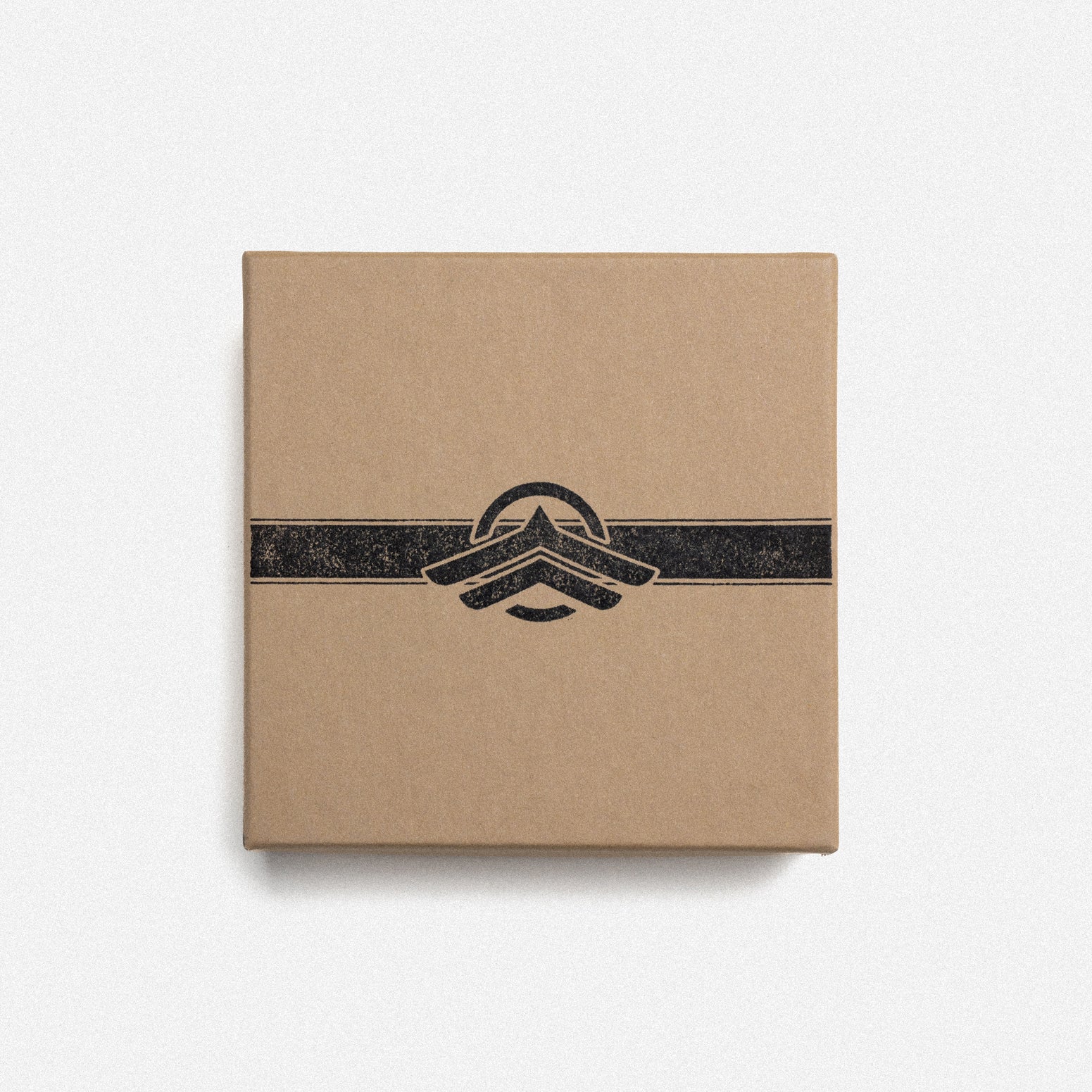 Kraft cardboard box with black band and geometric logo design