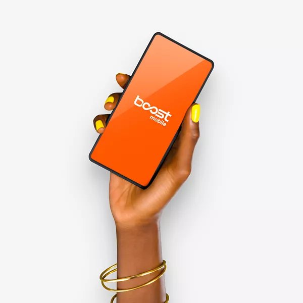 Hand holding orange smartphone with