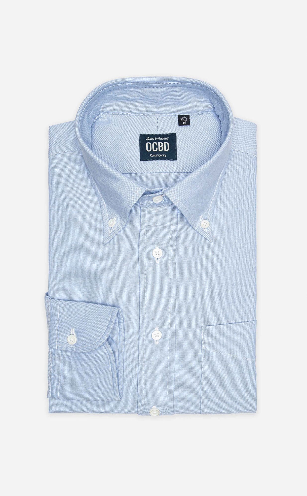 Light blue button-down Oxford shirt with white buttons and chest pocket, flat lay on gray background