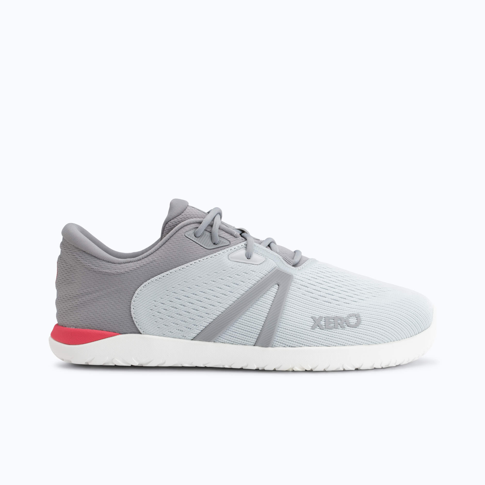 Light gray and dark gray running shoe with gray laces and white sole with red heel accent, shown from the side