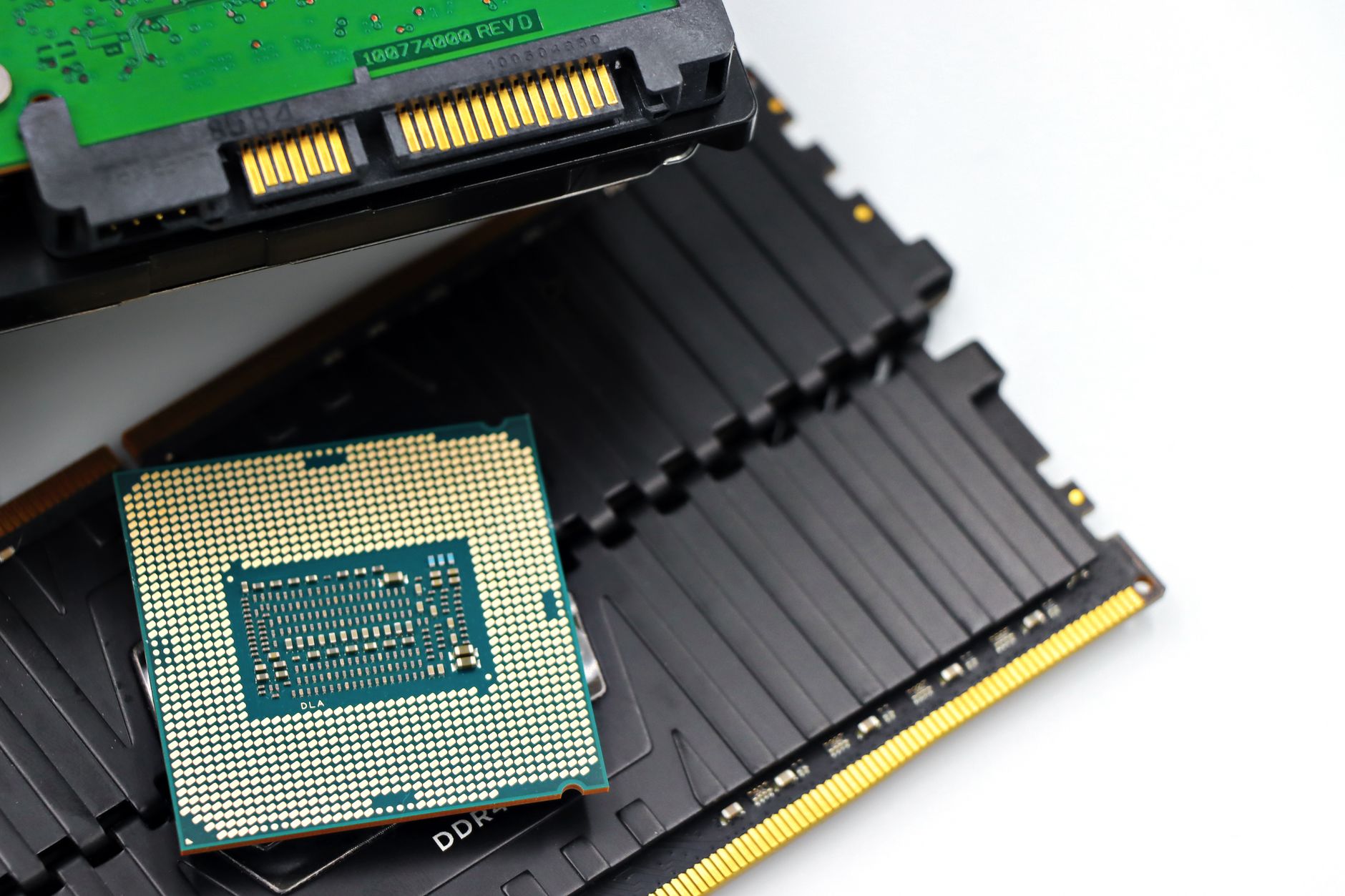 Close-up view of a CPU processor installed in a motherboard socket with power connectors visible above