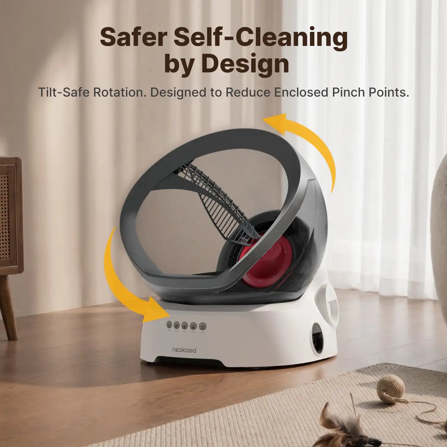 Automatic cat litter box with tilt-safe rotation feature and yellow arrows showing rotational movement